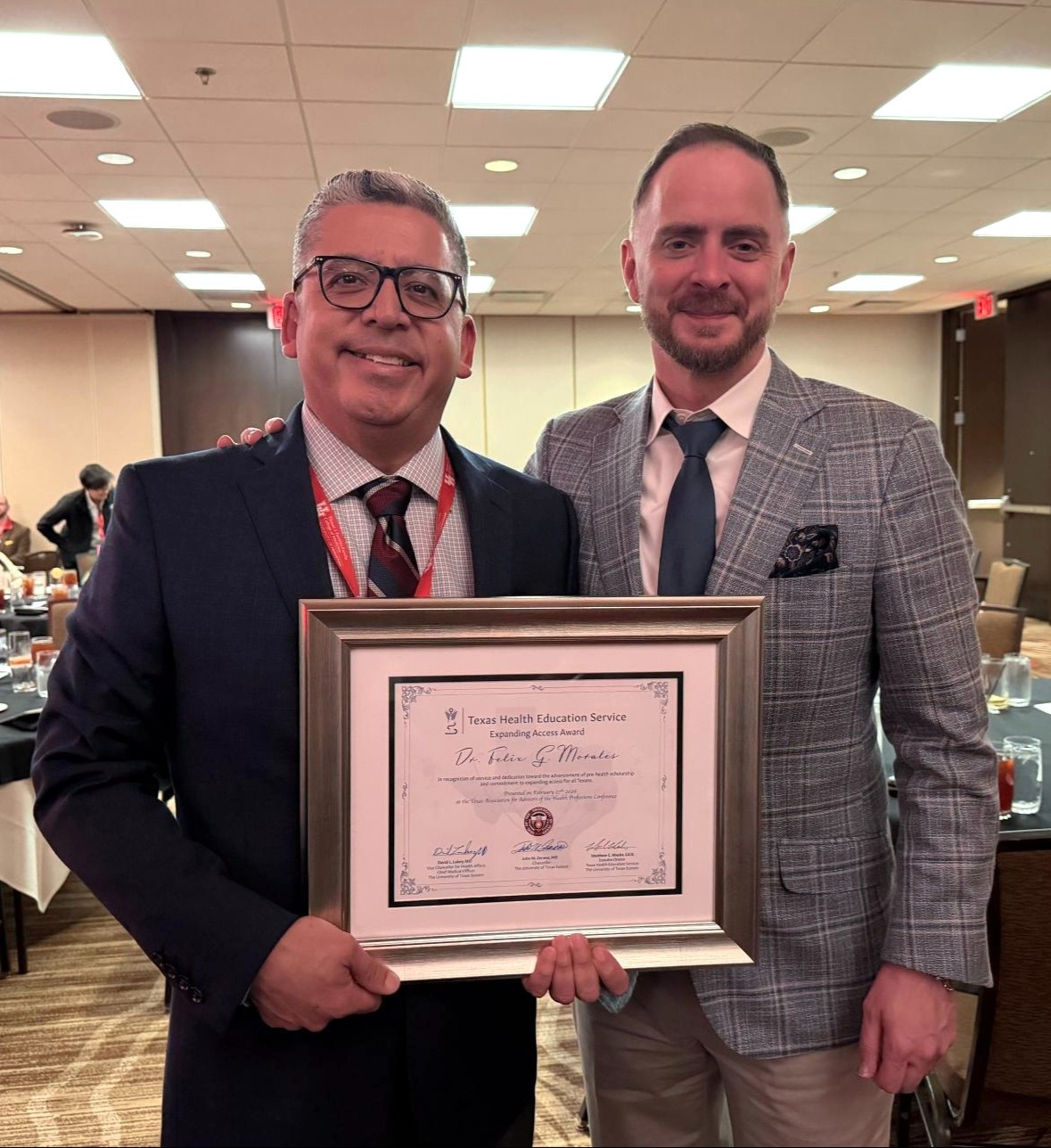 Award recipient Dr. Morales with Executive Director of TXHES Matthew Meeks